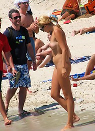 Teen nudists get naked and heat up a public beach